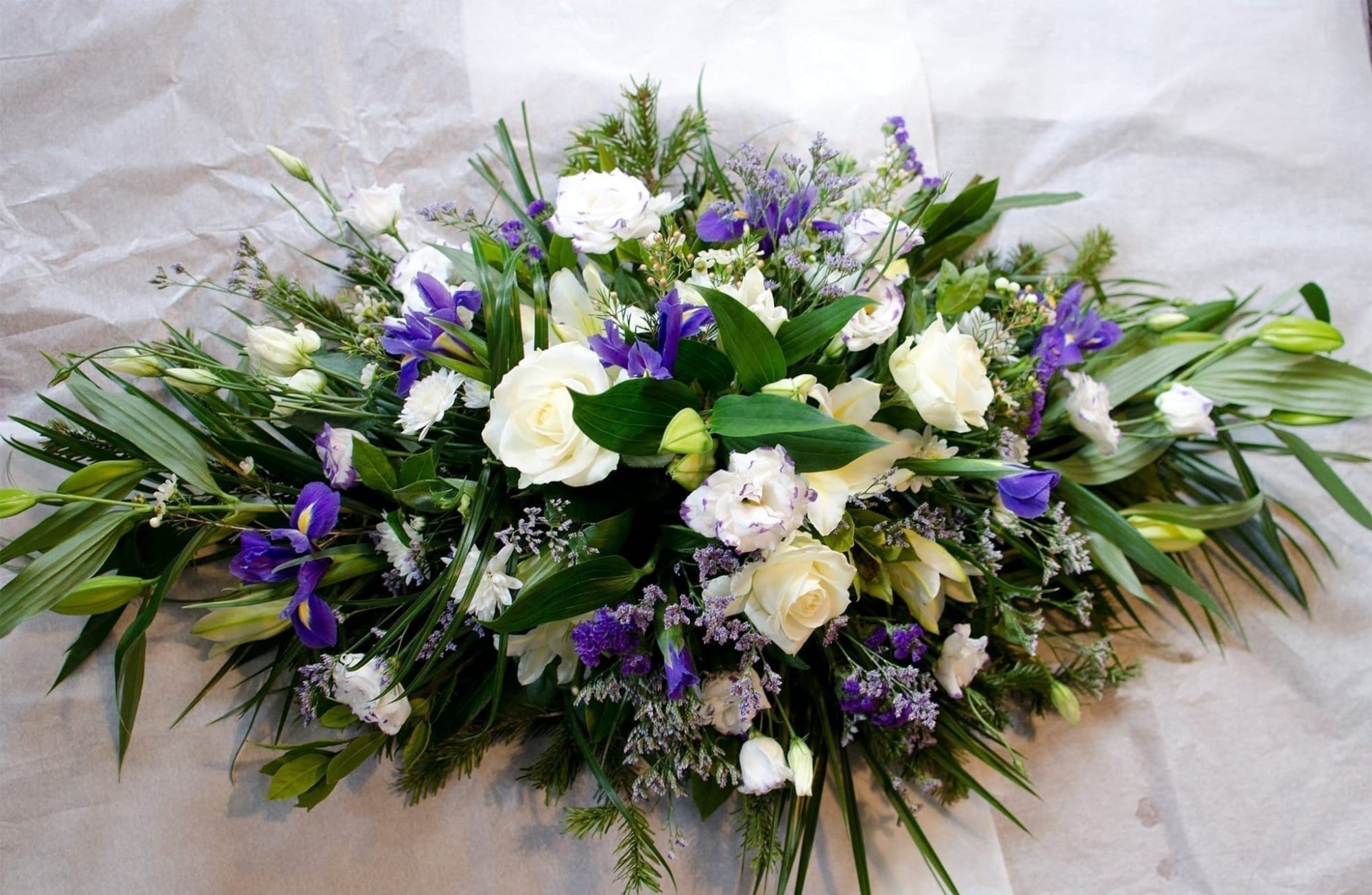 blue and white funeral spray flower delivered tipperary