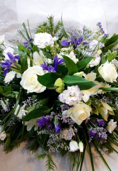 blue and white funeral spray flower delivered tipperary