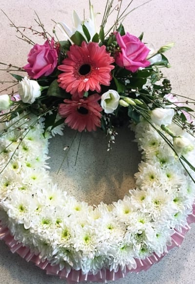 white and pink massed funeral wreath tipperary