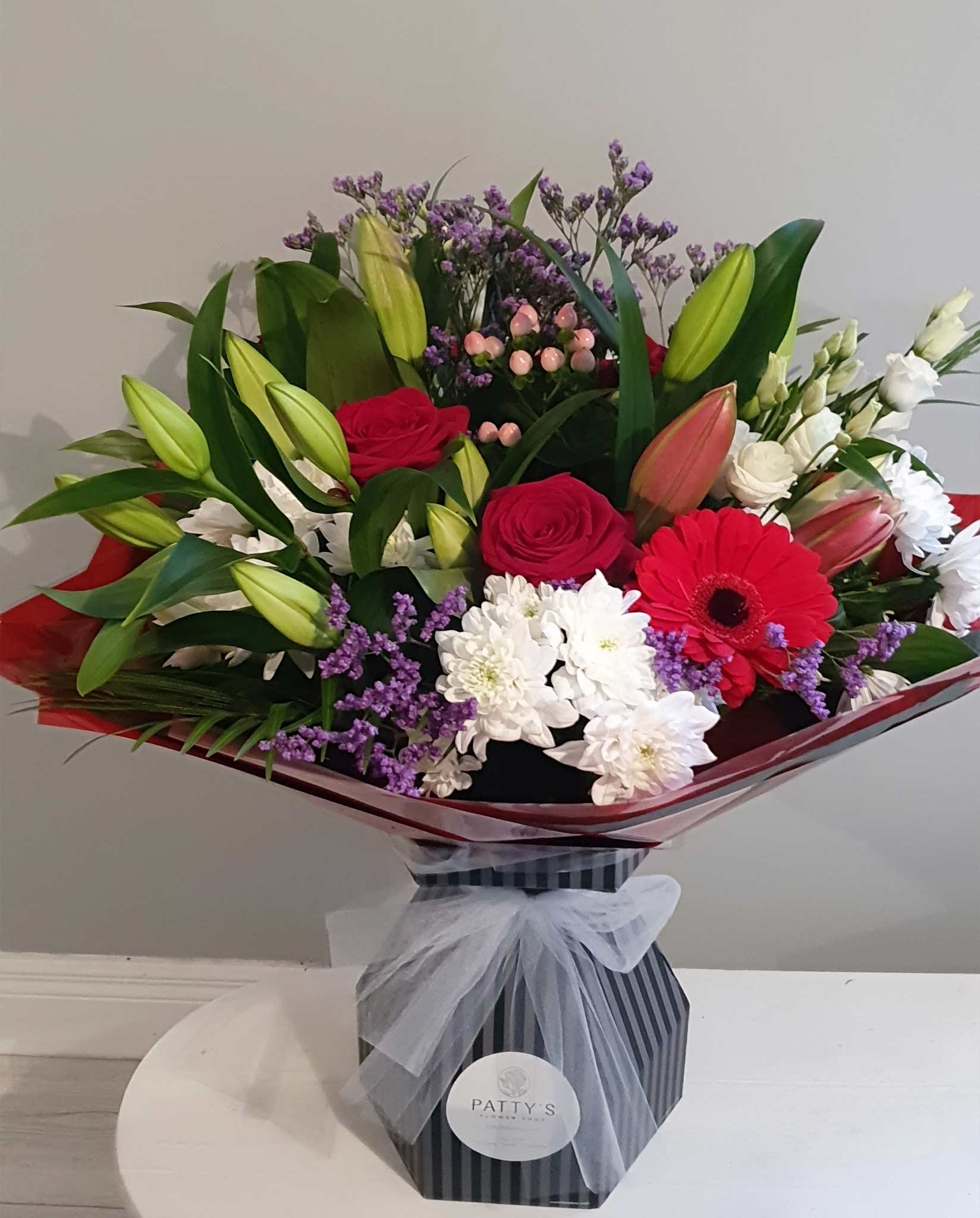 hand-tie bouquet roses lilies flowers tipperary